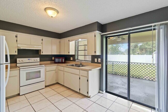 Building Photo - "Charming 2-Bedroom Duplex in Port Charlot...