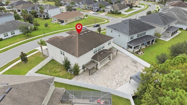 Building Photo - Spacious 6-Bedroom Home Near Lake Nona | 3-Car Garage + Tesla Charger