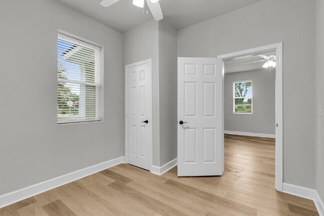 Building Photo - Cute all brick ranch on a large corner lot with fenced in yard and 1 car garage