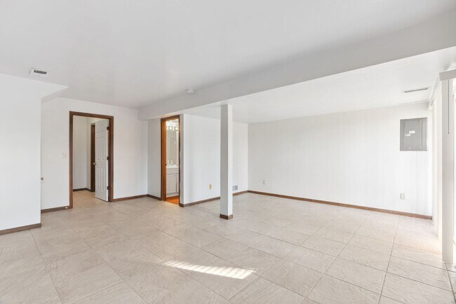 Building Photo - COMING SOON - Spacious 2-Bed, 3.5-Bath Townhouse with Stunning Lake Views