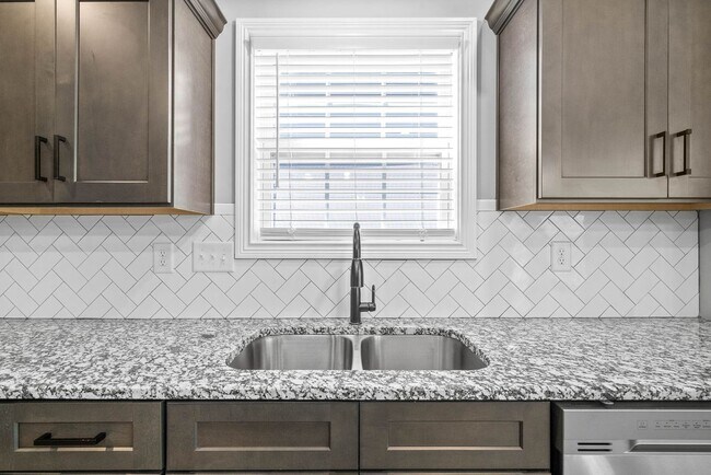 Building Photo - Pet Friendly Three Bedroom with Bonus!