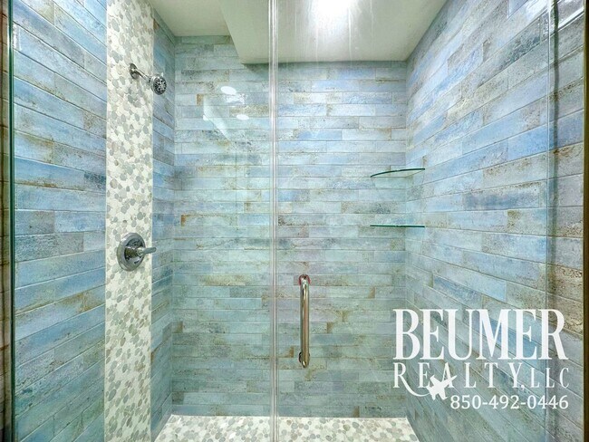 Building Photo - Upscale 3 BR 3 BA furnished Condo On the G...