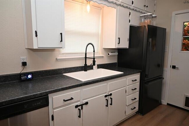 Building Photo - Spacious 4 Bedroom Brick Home Near Sheppard AFB with Fenced Backyard