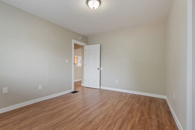 Building Photo - Spacious 5-bed, 2.5-bath home available in...