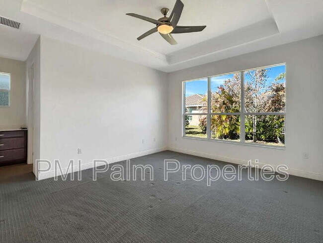 Building Photo - 9870 SW Trumpet Tree Cir