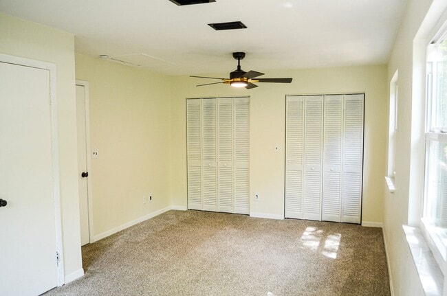 Building Photo - Check out this huge private fenced back yard at this Timberlane home!