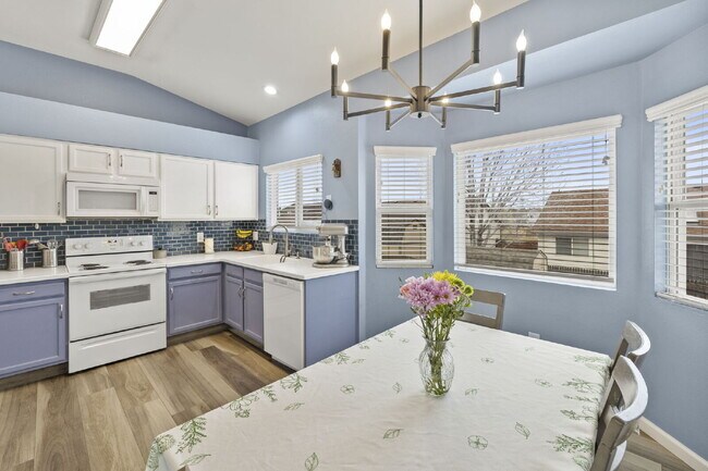 Building Photo - Spacious 4-Bedroom Home with Fenced Yard, 2-Car Garage & Scenic Views in Cheyenne Meadows