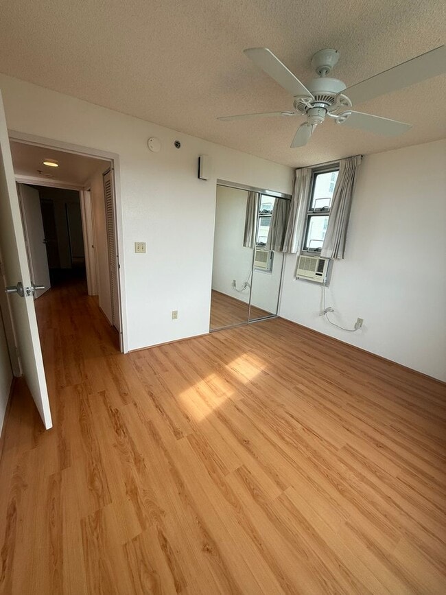 Building Photo - AC in Every Room. TWO Parking Stalls.