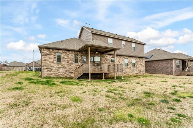 Building Photo - Minutes from I-49! 4BR/2.5BA Home