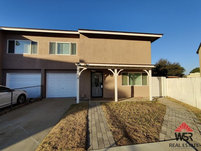 Primary Photo - 4 Bedroom - 1.5 Bath home with a large bac...