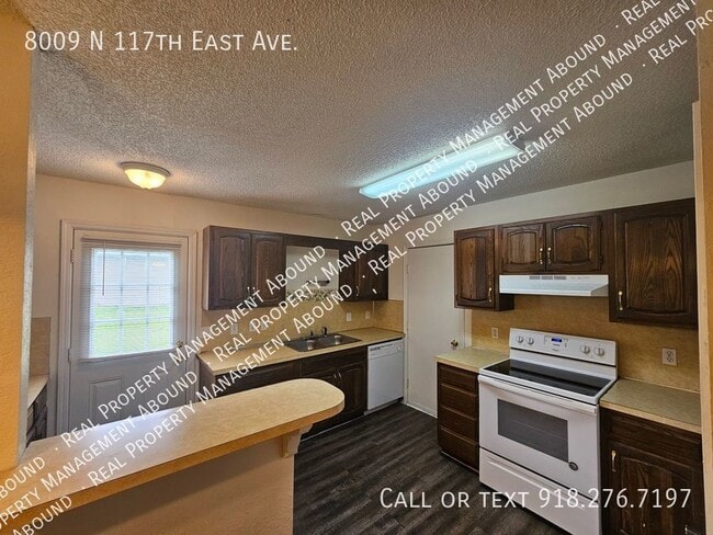 Building Photo - 8009 N 117th E Ave