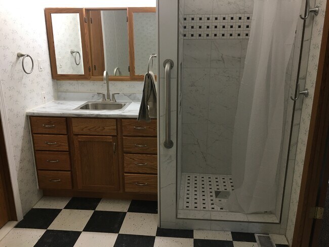 12-1/2 feet x 7-1/3 feet master bath. Large bath has both a oversized tub and a shower. - 585 110th Ave
