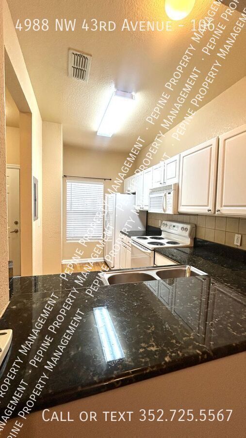 Building Photo - 4988 NW 43rd Ave