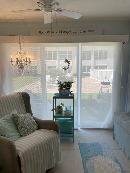 Electric blinds for privacy - 3851 N Ocean Blvd