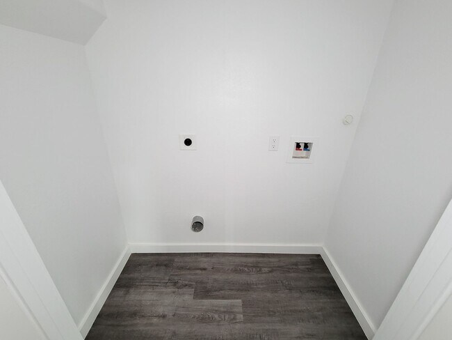 Building Photo - This newly constructed 3-bedroom, 2-bathroom unit offers modern living with 1,150 sq ft of space....