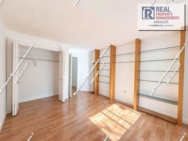 Building Photo - Spacious 2BR/2BA Condo with Garage, Balcony, Pool & Mine Falls Access