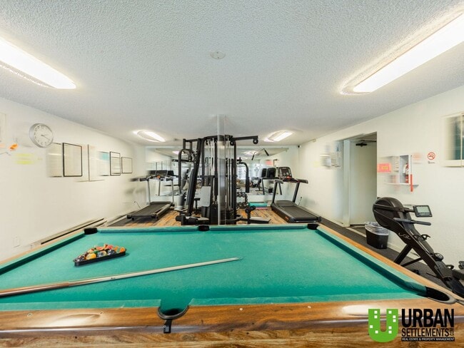 Building Photo - Comfortable 1-Bedroom Condo with Parking & Resort-Style Amenities