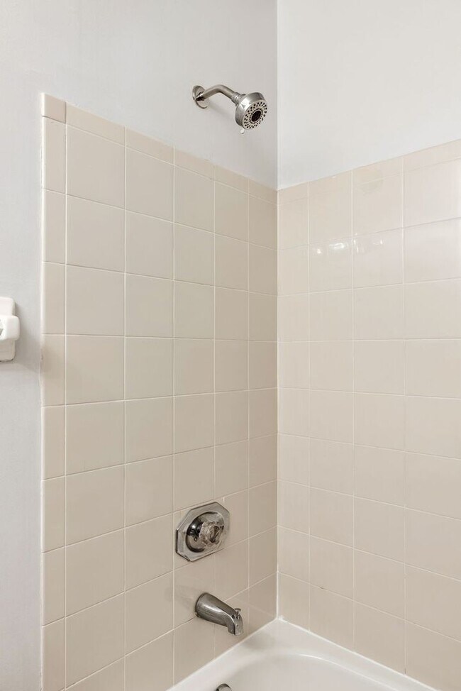 Building Photo - COMING SOON - Spacious 2-Bed, 3.5-Bath Townhouse with Stunning Lake Views