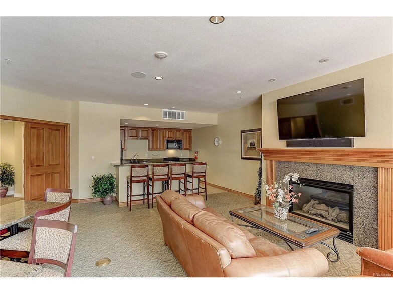 Communal room with a full kitchen - 2700 E Cherry Creek South Dr
