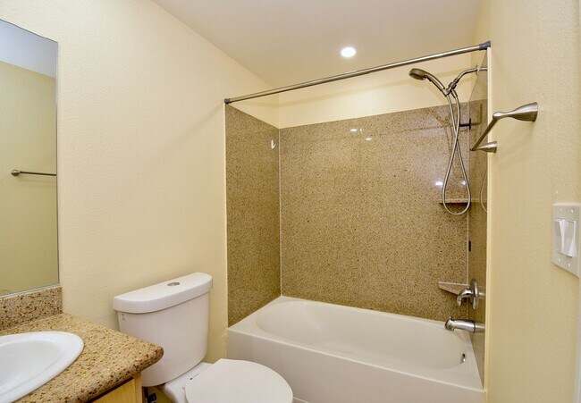 Building Photo - Upgraded & Charming Two-Bedroom Condo with...