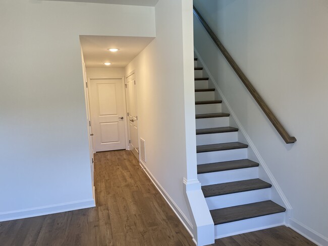 Hallway to garage/upstairs - 196 Colony Ave