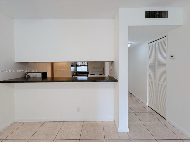 Building Photo - 8550 N Sherman Cir