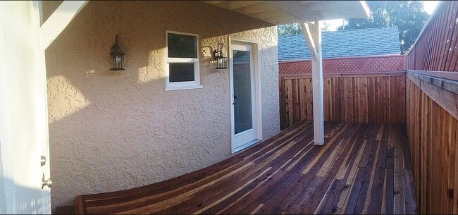 deck, w/ door leading to kitchen - 319 W Chevy Chase Dr