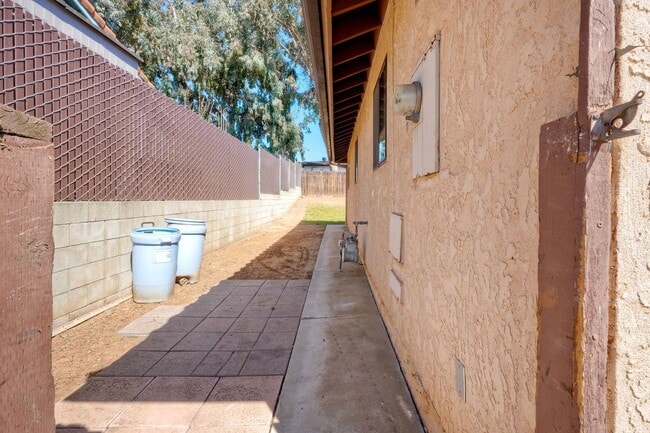 Building Photo - Corner Lot 4BR with Vaulted Ceilings & Big Yard