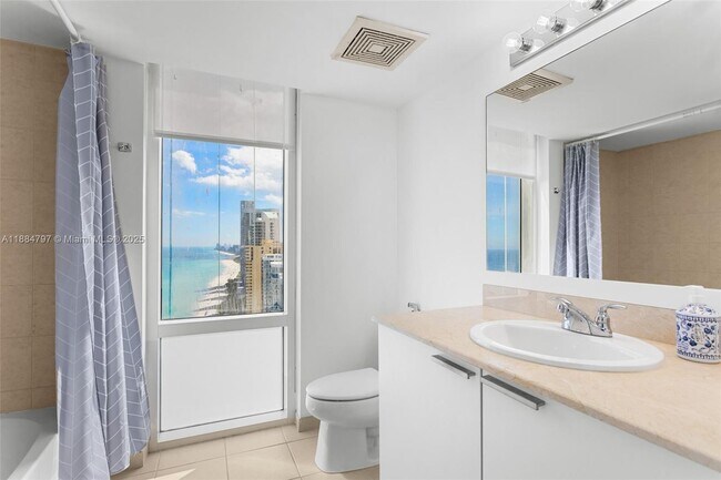 Building Photo - 16699 Collins Ave