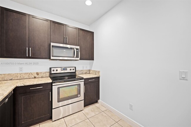 Building Photo - 6907 Pines Cir