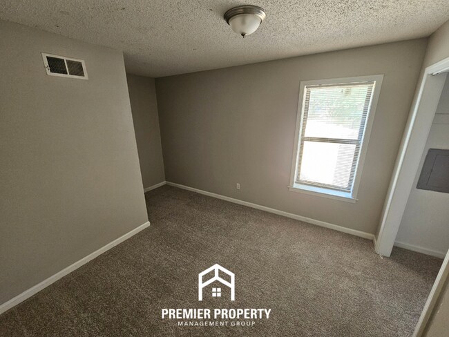 Building Photo - Stunning 3BR/2BA Home | 1,644 Sq Ft, Floor-to-Ceiling Stone Fireplace & High Ceilings