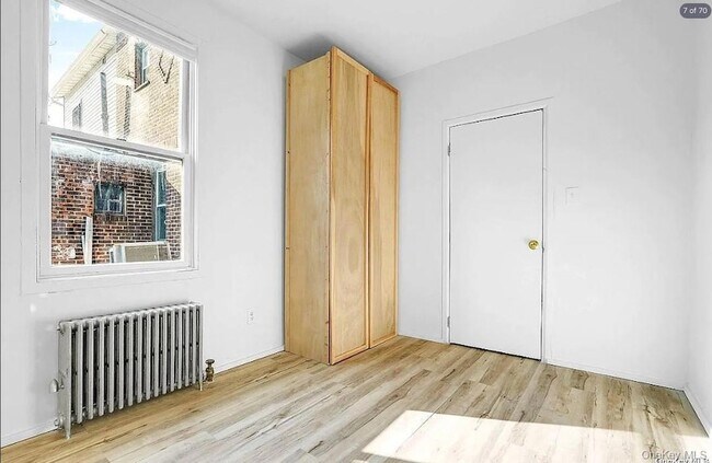 Building Photo - 3-08 26th Avenue Unit 1