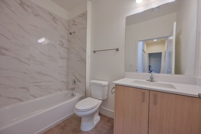 Building Photo - Brand New Spacious Towhouse Style 2 Bedroo...