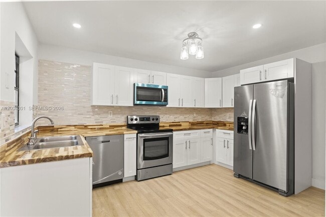 Building Photo - Northwest 169th Street, Hialeah, FL 33015 - 3 BR 2.5 BA townhouse