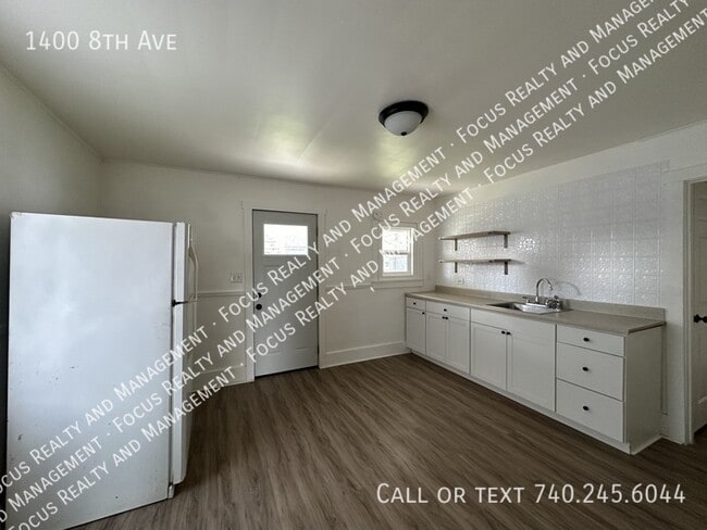 Building Photo - 1400 8th Ave