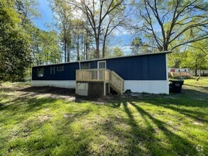 Building Photo - Adorable 2 bedroom 2 bath Mobile Home loca...