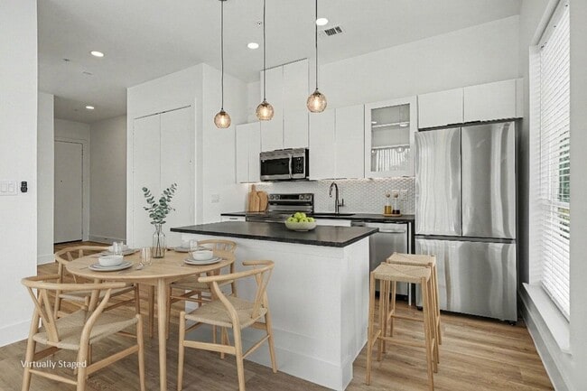Building Photo - Be the first to live in Unit 207 at 2217 Fitzhugh—a brand-new 2026 construction offering 601 sq f...