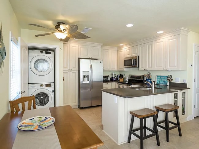 Building Photo - Stunning 2/1 available now at Waterside at Coqunia Key!