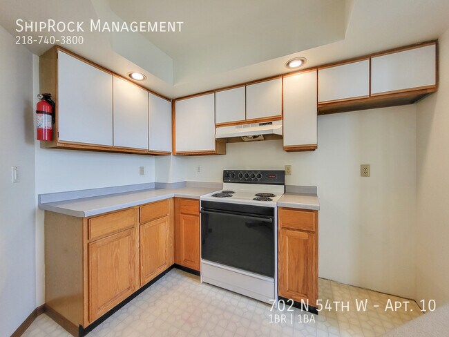 Building Photo - 702 N 54th Ave W