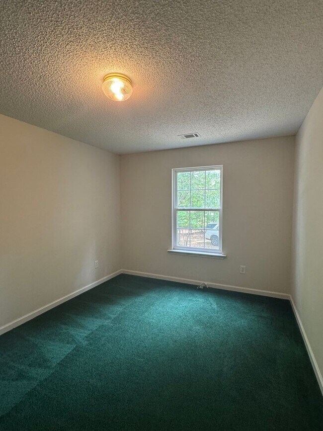 Building Photo - Spacious 4-Bedroom Home on Large Corner Lo...