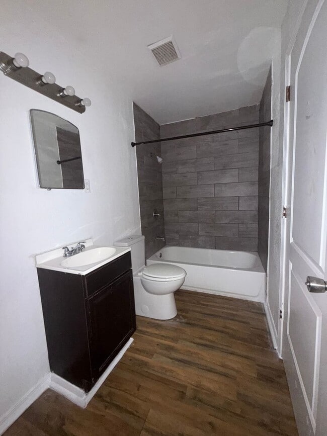 Building Photo - Passariello Management