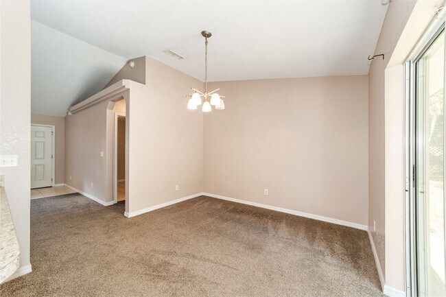 Building Photo - Peaceful 3-Bedroom Home with Open Floor Plan & Two-Car Garage in Rainbow Lakes Estates!