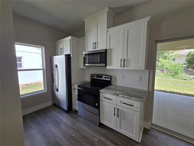 Building Photo - 7435 Mead Dr