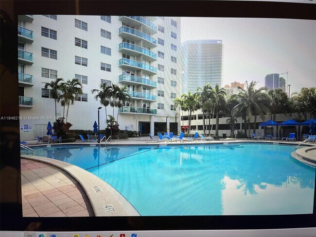 Building Photo - 19370 Collins Ave