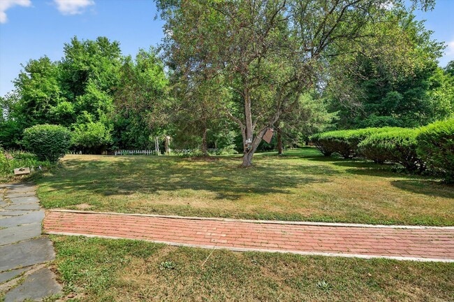 Building Photo - Price Reduction: Charming 3BR Farmhouse Re...