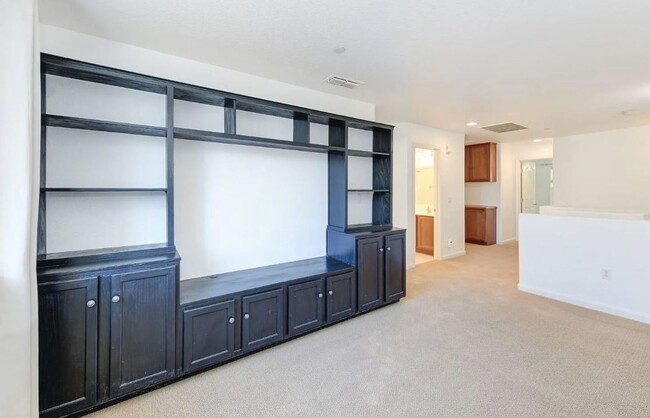 Building Photo - Experience Esplanade! Premier Townhome Com...