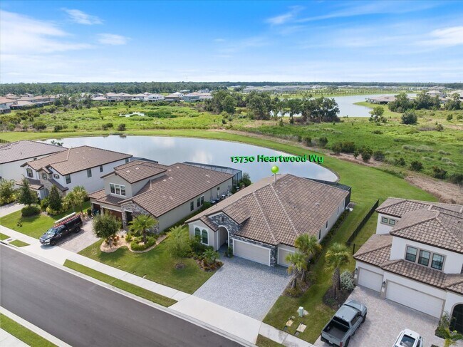 Building Photo - Luxury Home w/ Pool, Outdoor Kitchen, Car Lift, & Water View In Parrish!