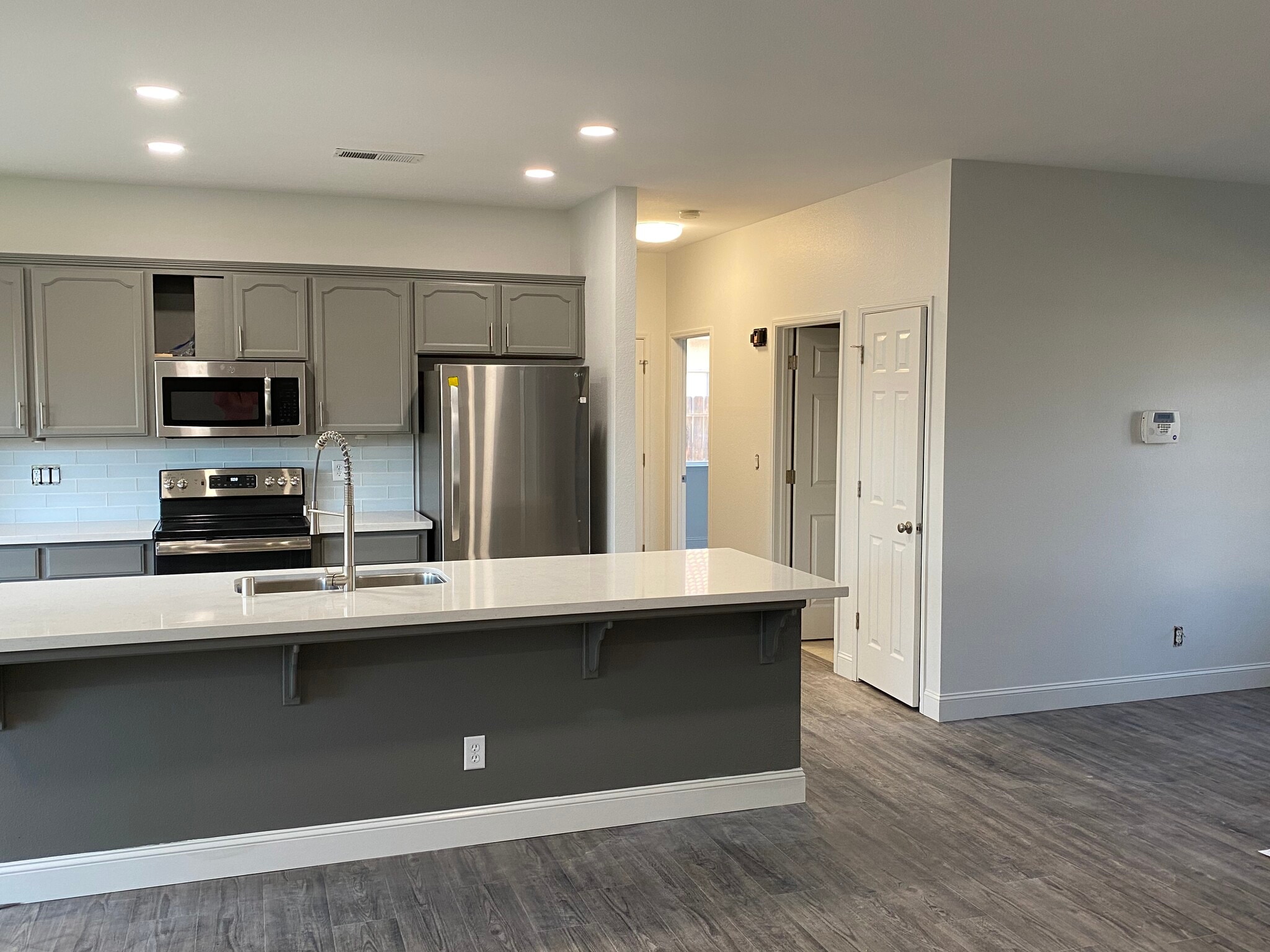 Kitchen &amp; partial front room view - 1134 Pine Ct