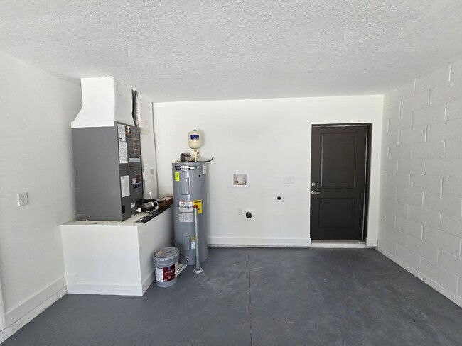 Building Photo - Brand-New 4-Bed Beauty with Attached Garage in Palm Bay – Modern Comfort, Prime Convenience!