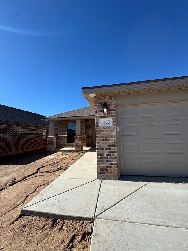 Building Photo - Brand New Construction 3/2/2  1/2 off spec...